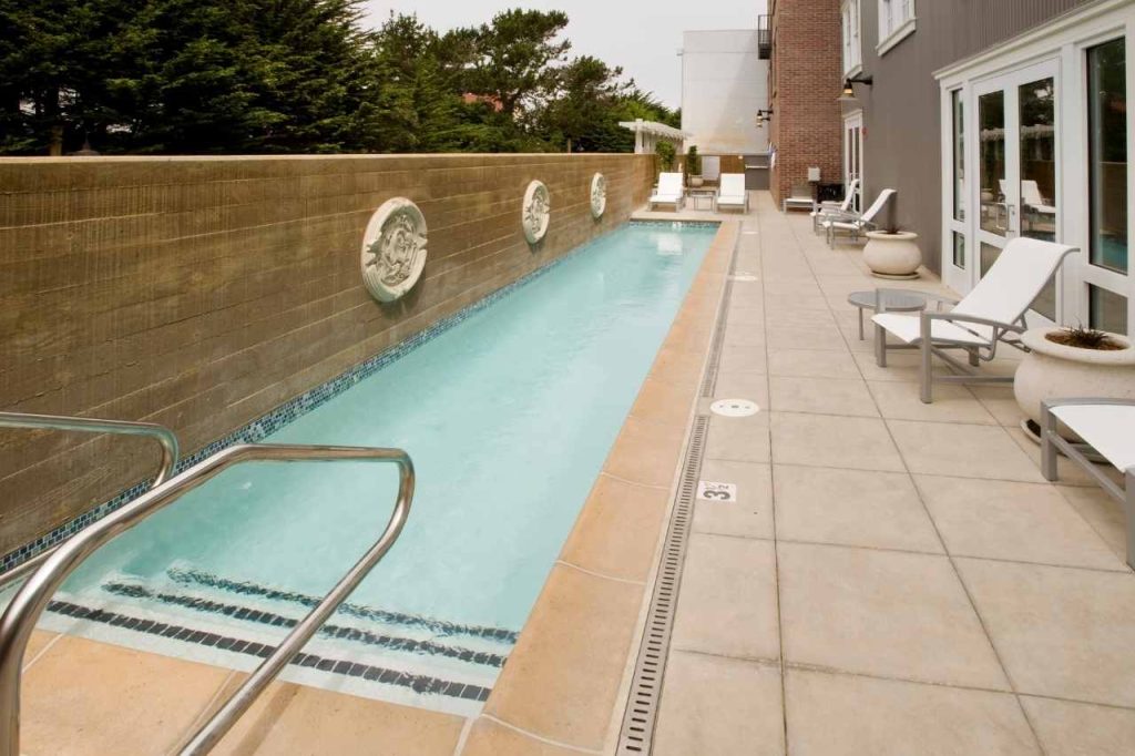 Long lap pool behind a house in brisbane