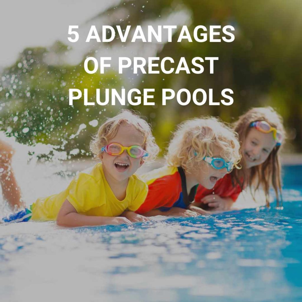 3 kids playing in a precast plunge pool on a sunny day