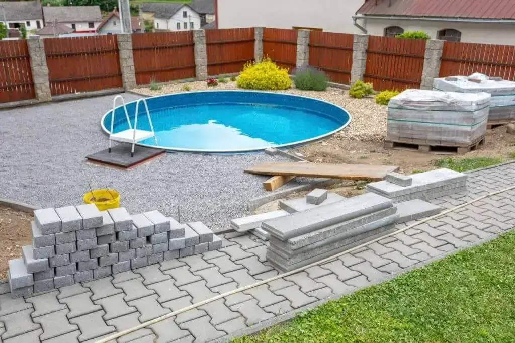 Round plunge pool in the backyard, enhancing and elevating the landscape.