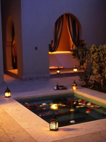 Square plunge pool featuring underwater lights installed, creating a magical and romantic atmosphere for nighttime relaxation.