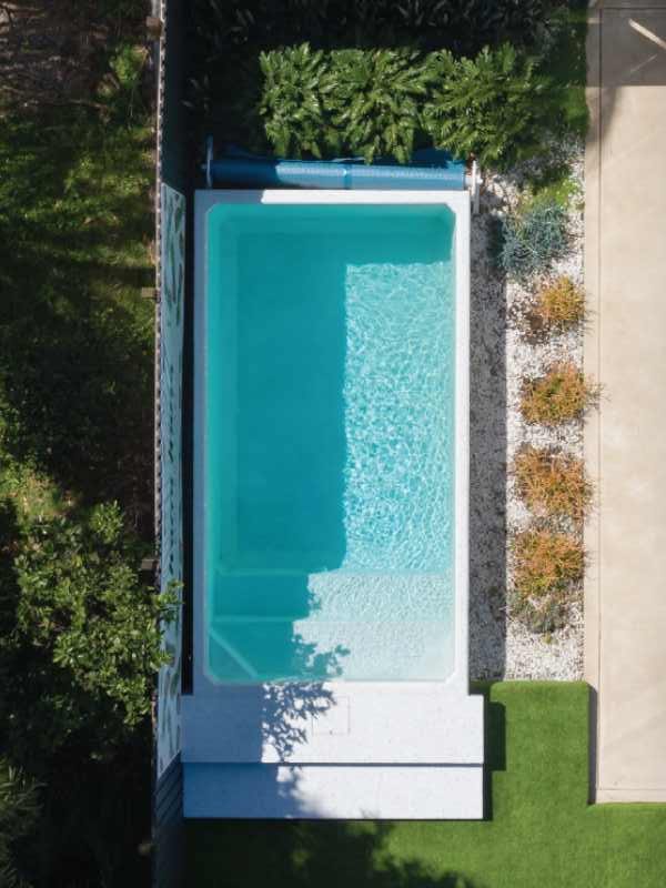 Beautiful Plungie Original plunge pool filled with turquoise water in a Brisbane backyard